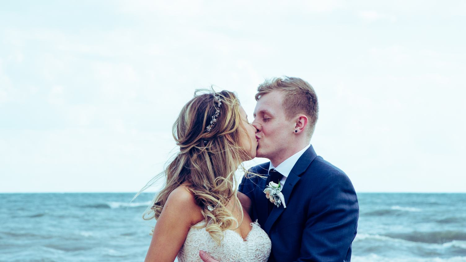 Wedding Couple Kissing on the Beach