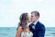 Wedding Couple Kissing on the Beach