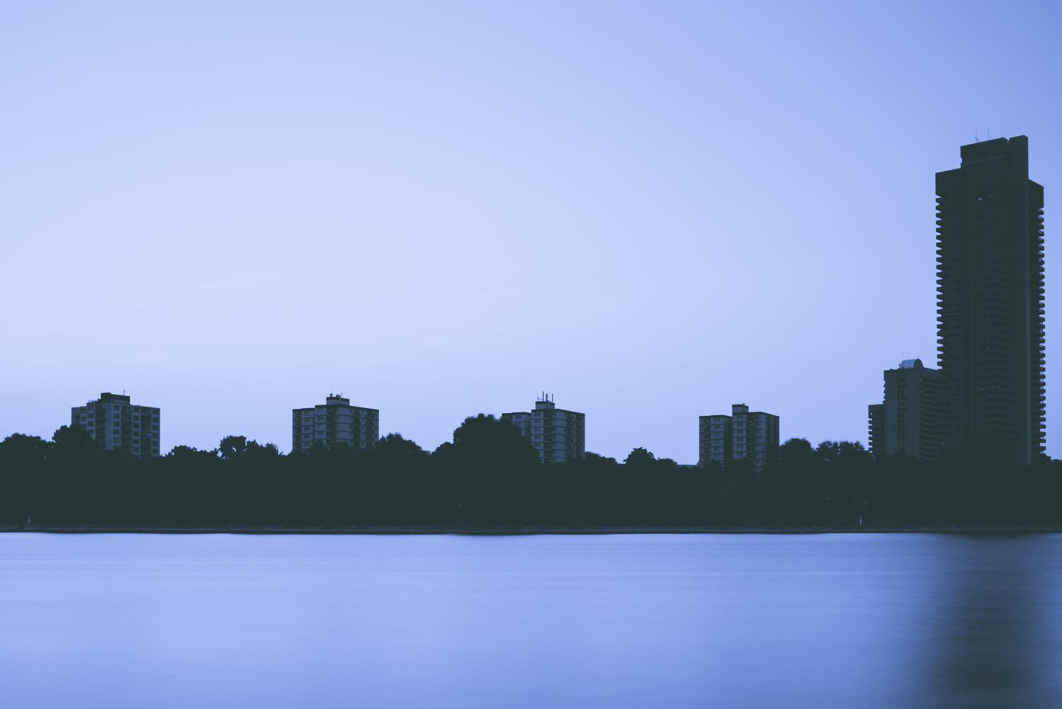 Silhouette of Buildings Near River