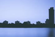 Silhouette of Buildings Near River