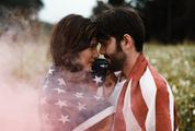 Couple Wrapped in a US Flag