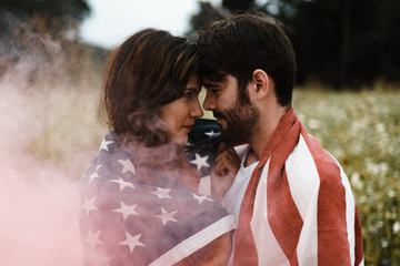 Couple Wrapped in a US Flag