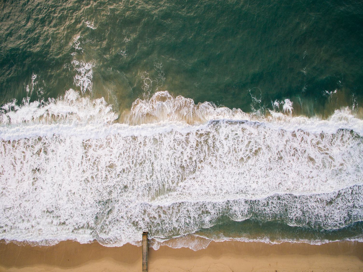 Free Photo Aerial View Of Ocean With Waves And Sand