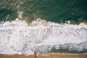 Aerial View of  Ocean with Waves and Sand
