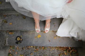 Bride Standing on Stairs Closeup of Legs