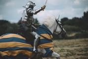 Knight Riding a Horse with Sword in His Hands