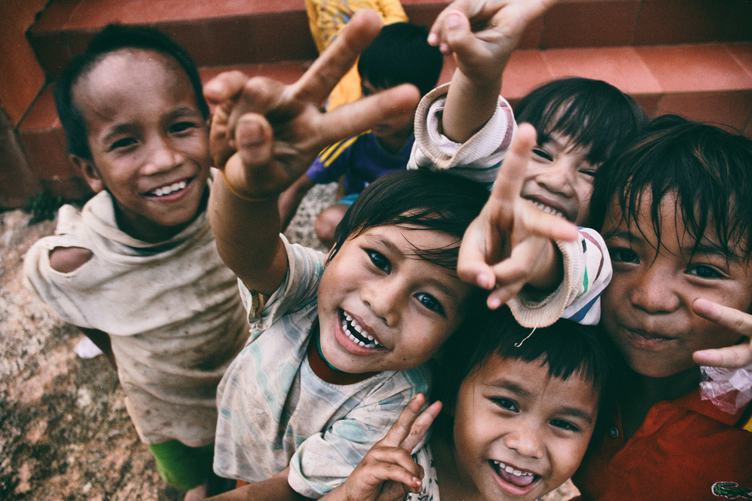 A Group of poor Vietnamese Children Smiling