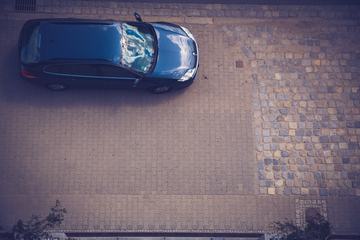 Car Parked on the Sidewalk View from Above