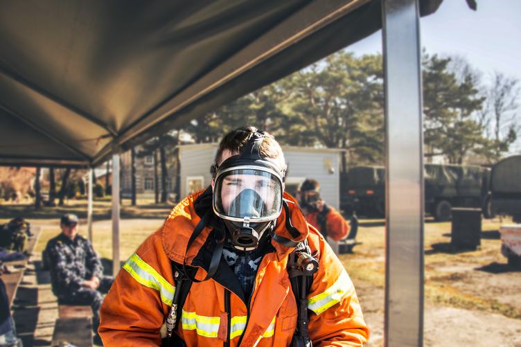 Portrait of Young Firefighter Wearing Mask