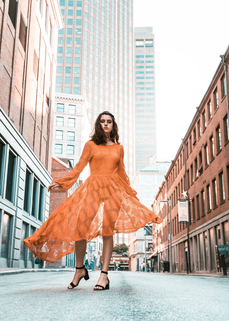 Woman in Orange Lace Dress, urban Portrait