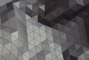 Abstract Closeup View of Modern Gray Triangles on Facade