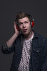 Portrait of Young Man with Red Headphones