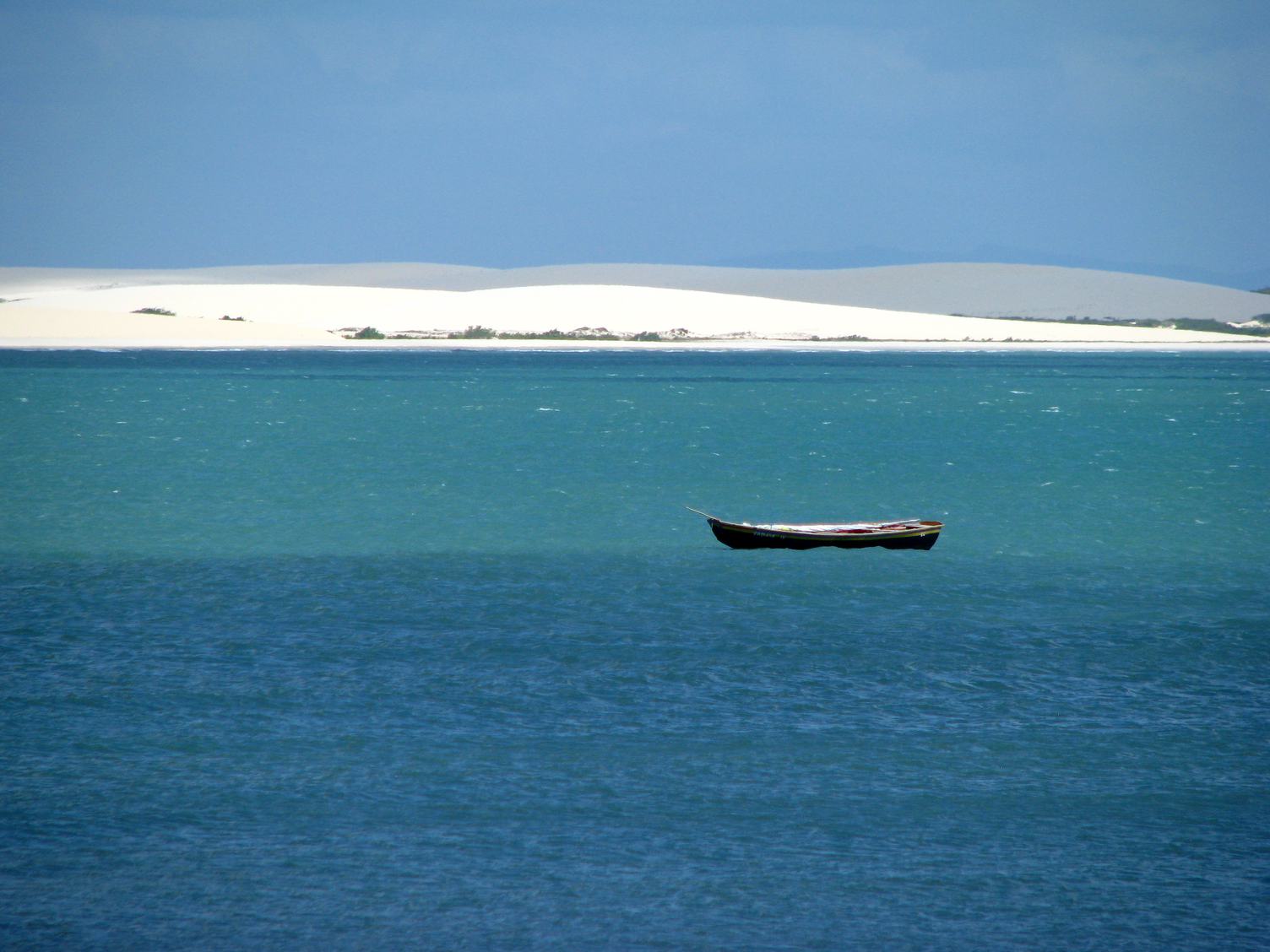 Canoe Floating on the Calm Water