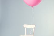 Pink Balloon Tied to a Chair