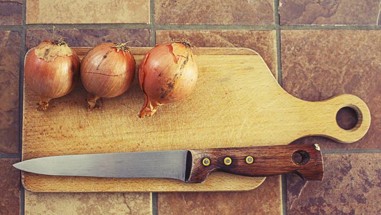 Onions on Wooden Cutting Board