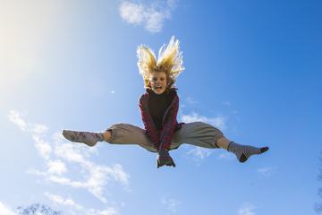 Young Girl Jumping High
