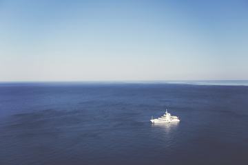 Single White Boat in the Ocean