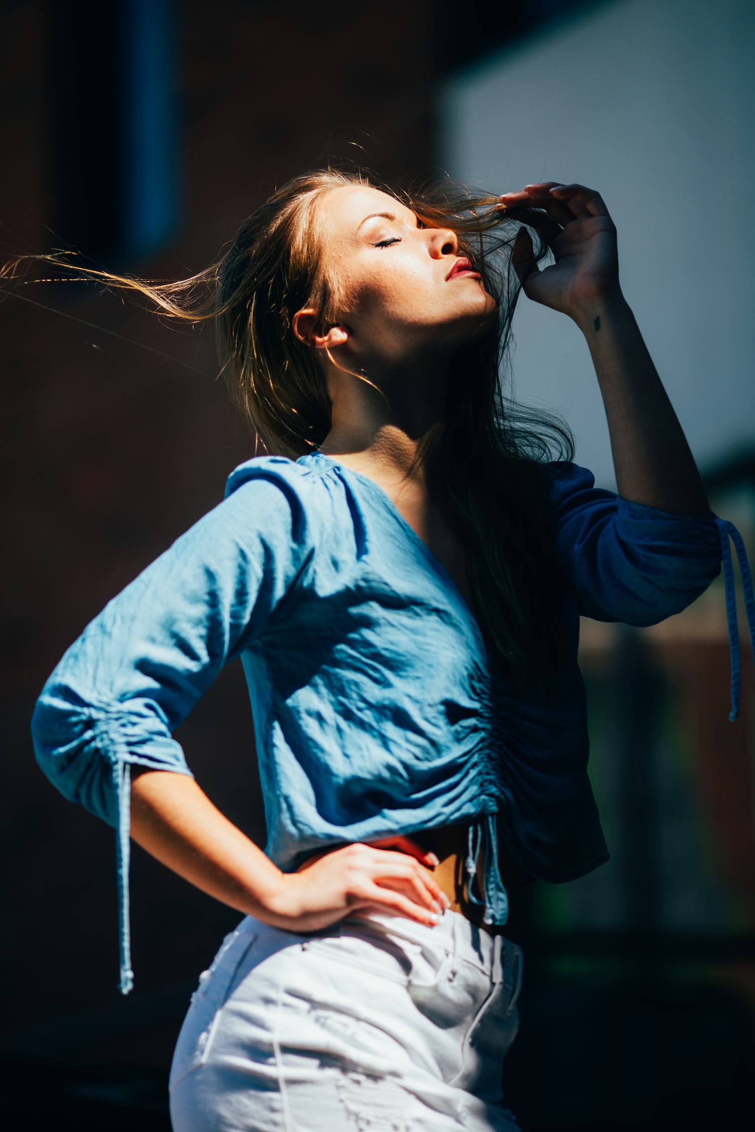 Woman Showing Her Face to the Sun