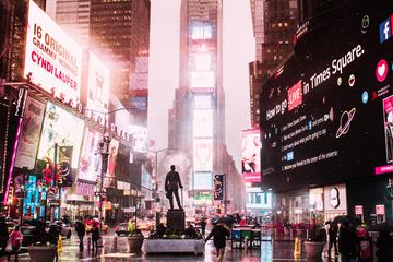 Times Square on rainy night.