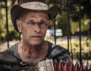 HDR Portrait of Man with Accordion