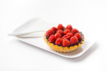 Raspberry Cupcake on a White Plate