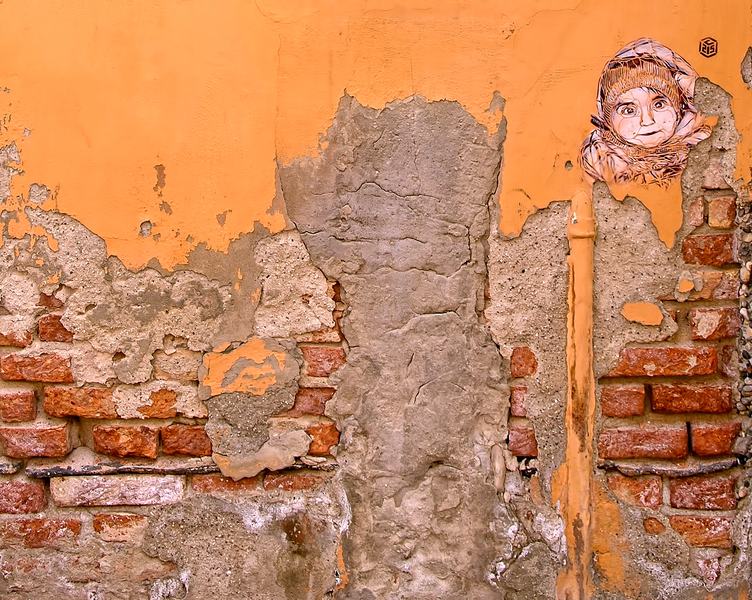 Cracked Concrete Brick Wall with Graffiti