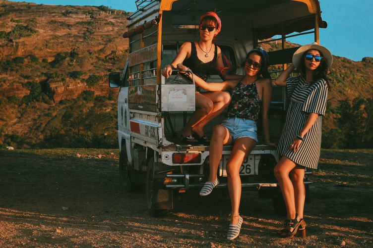 Three Young Women on Pickup Truck