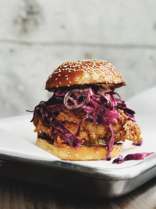 Free Photo Burger in Brioche Bun with Red Cabbage Coleslaw