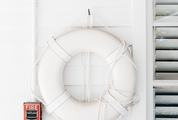 White Lifebuoy Hanging on the Wall