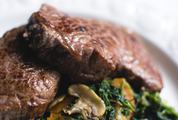 Close View of Beef Steak with Spinach