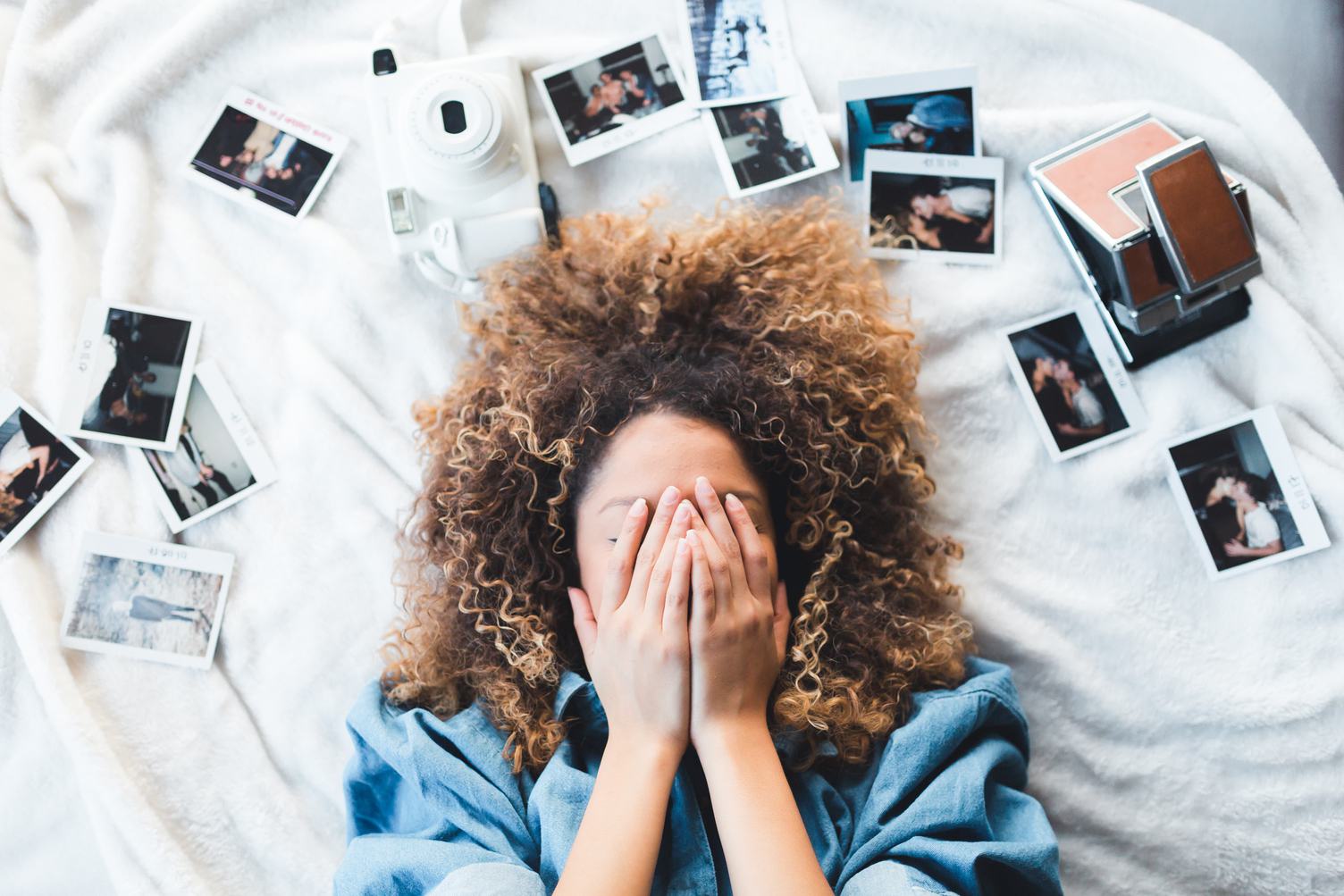 Woman Covering Her Face with her Hands