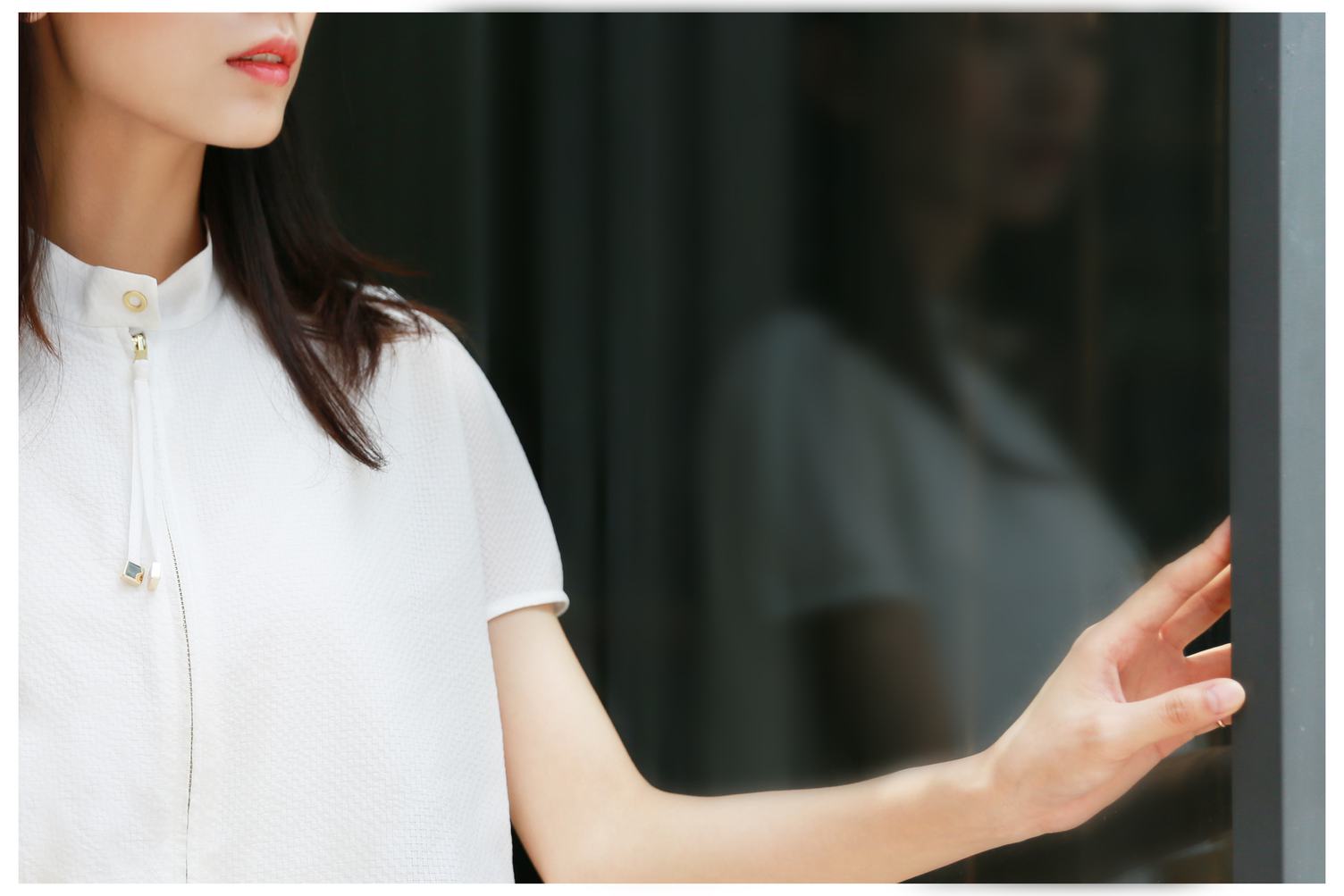 Young Woman Standing Wearing White Shirt