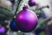 Purple Christmas Balls Hanging on a Christmas Tree