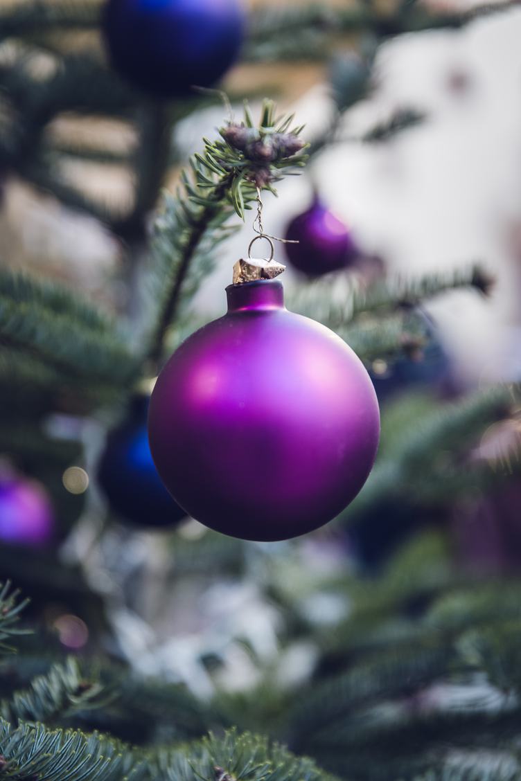 Purple Christmas Balls Hanging on a Christmas Tree