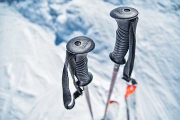 Closeup View of the Ski Poles in the Snow