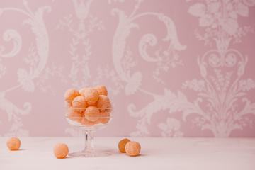Sweet Bowls against Pink Ornament Wallpaper