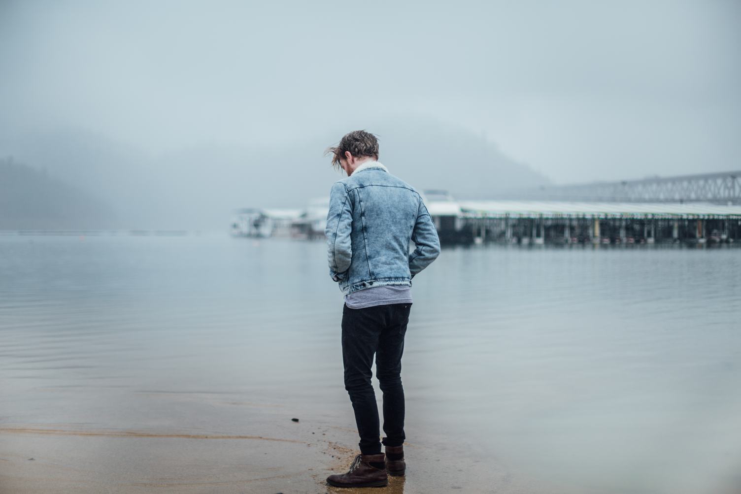 Man Standing at the Lake