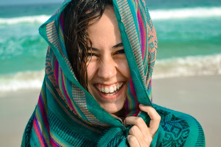 Portrait of a Smiling Girl on the Beach