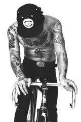 Man with Cool Tattoos on the Bike