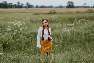 Young Woman in Summer Field