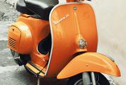 Orange Vespa Scooter