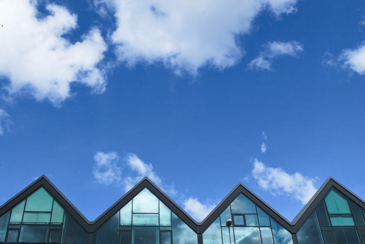 Glass Buildings against Blue Sky