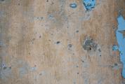 Grunge Wall with Remnants of Blue Paint