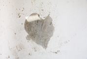 Heart Hidden in Concrete on the Wall